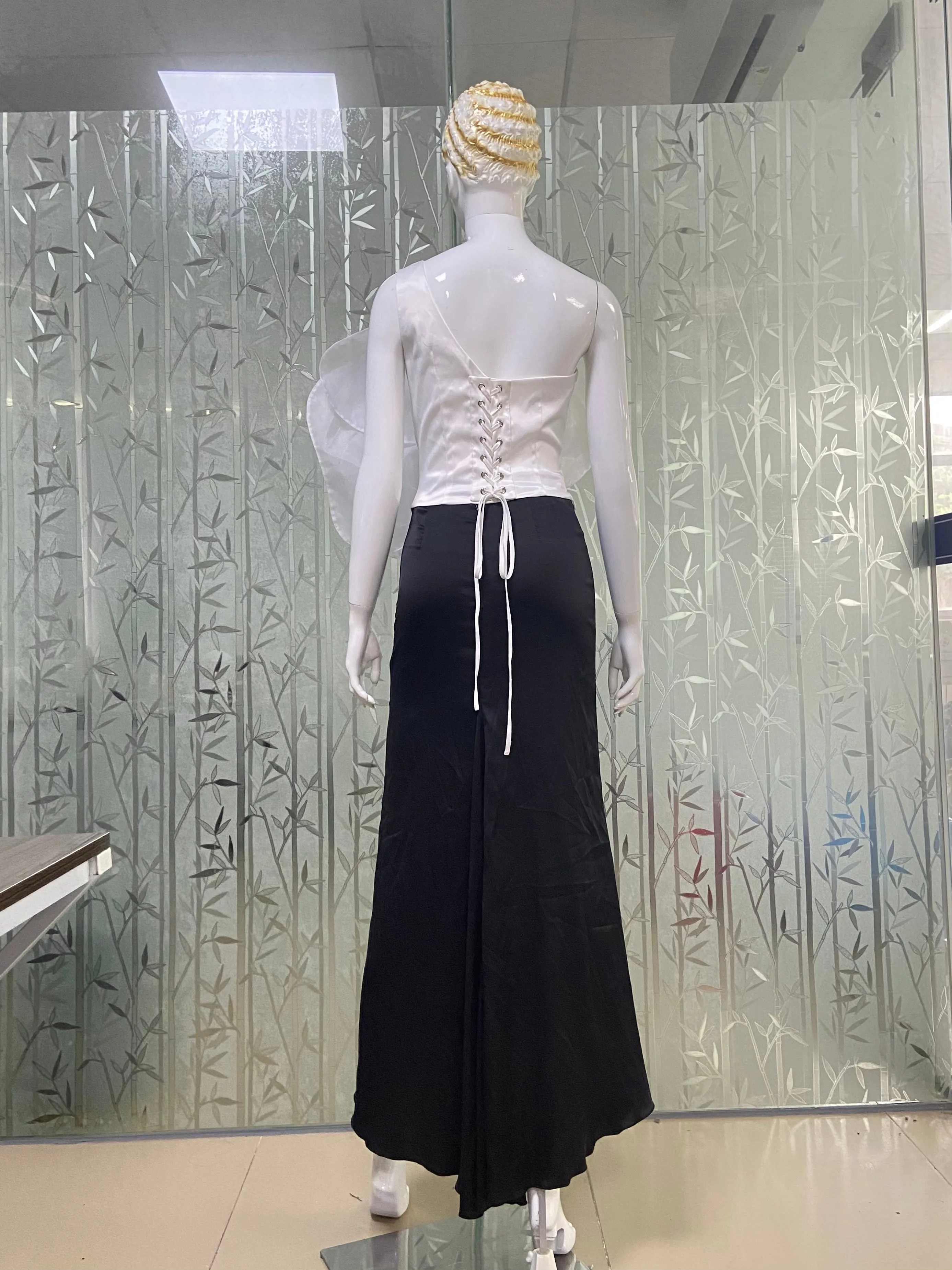 3D WHITE FLOWER ONE-SHOULDER MAXI DRESS IN BLACK Gloria Lanvin