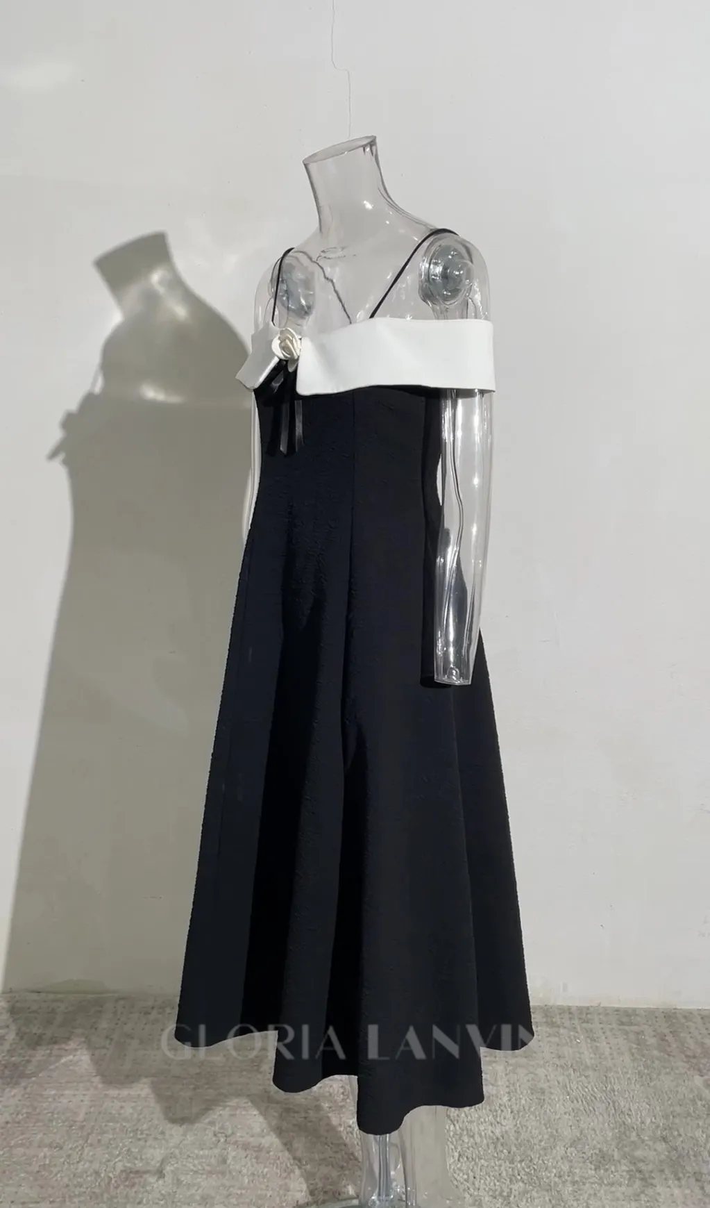 ATALANTA TEXTURED PLEATED SUSPENDER DRESS IN BLACK Gloria Lanvin