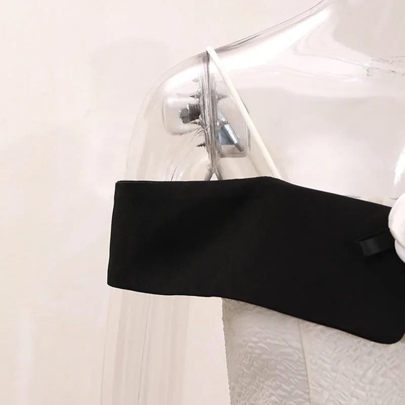 ATALANTA TEXTURED PLEATED SUSPENDER DRESS IN BLACK Gloria Lanvin