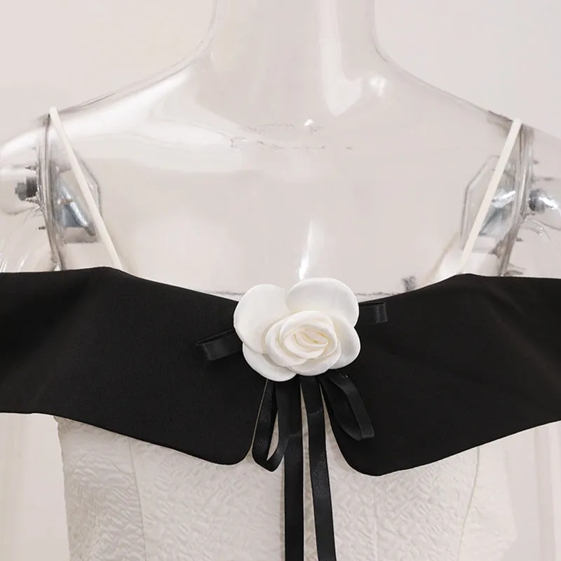 ATALANTA TEXTURED PLEATED SUSPENDER DRESS IN BLACK Gloria Lanvin