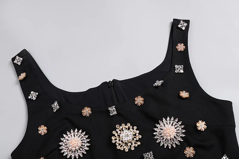 BROOCH-EMBELLISHED SCOOPNECK GOWN IN BLACK Gloria Lanvin