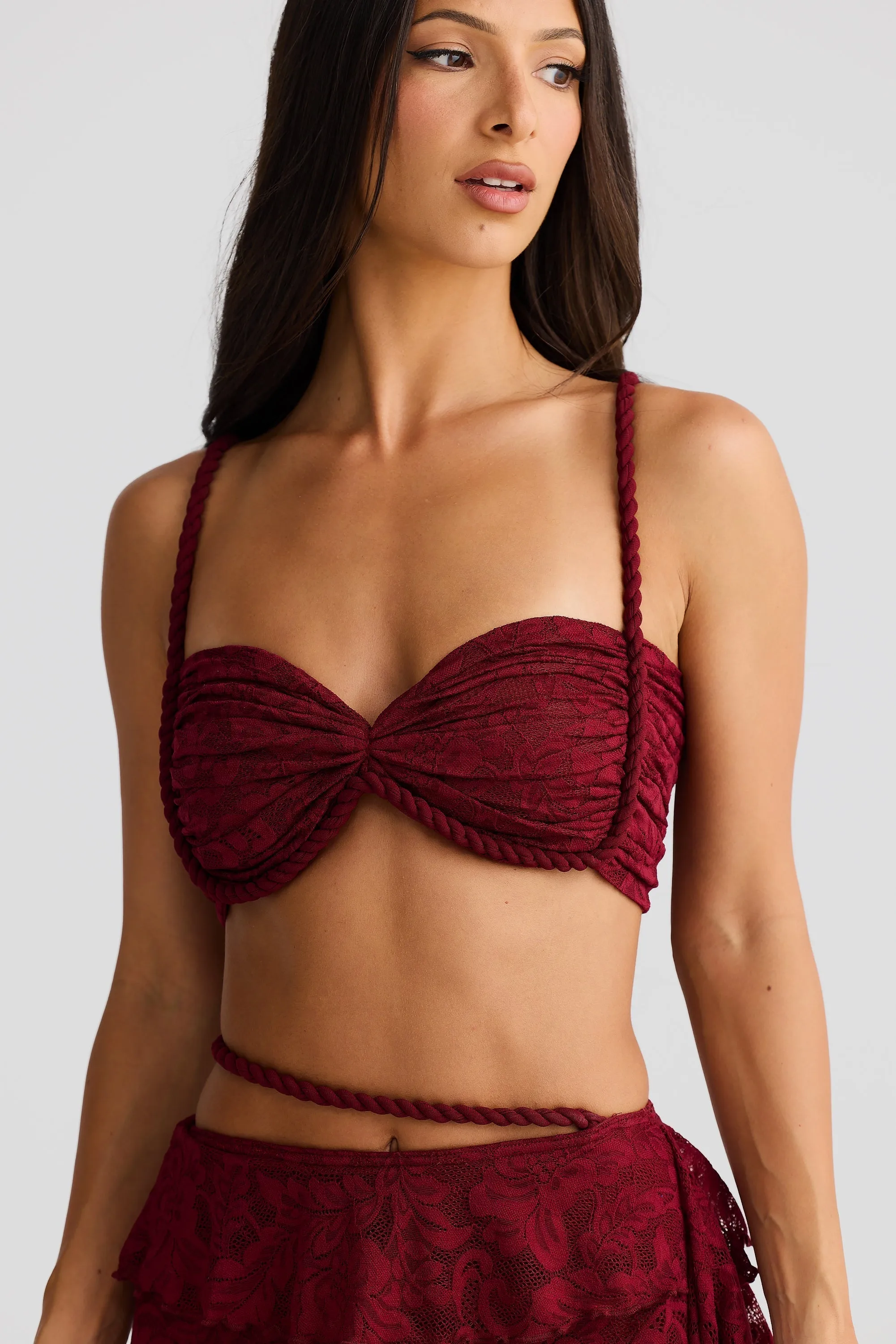 crafted rope crop top  lace skirt set in burgundy Gloria Lanvin