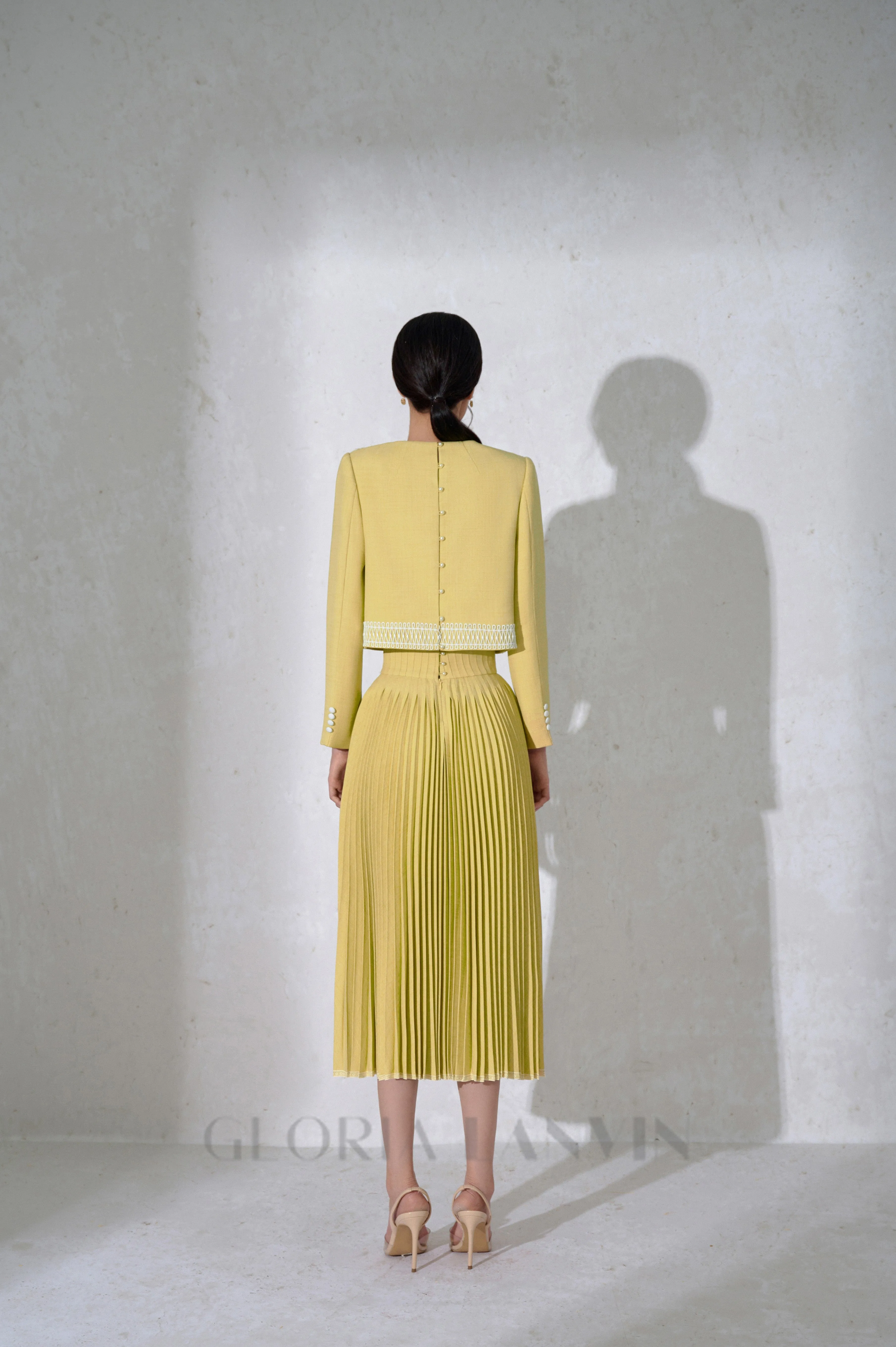 draped top pleat skirt set in yellow Gloria Lanvin