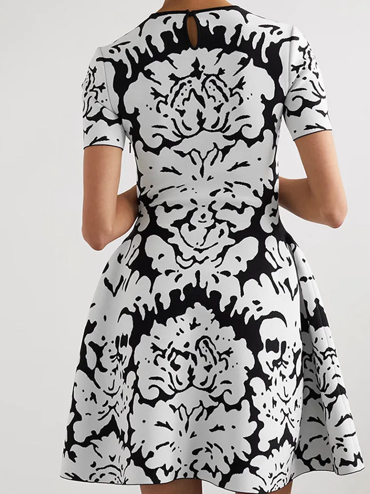 FLORAL-PATTERN STRETCH-KNIT MINI DRESS Gloria Lanvin