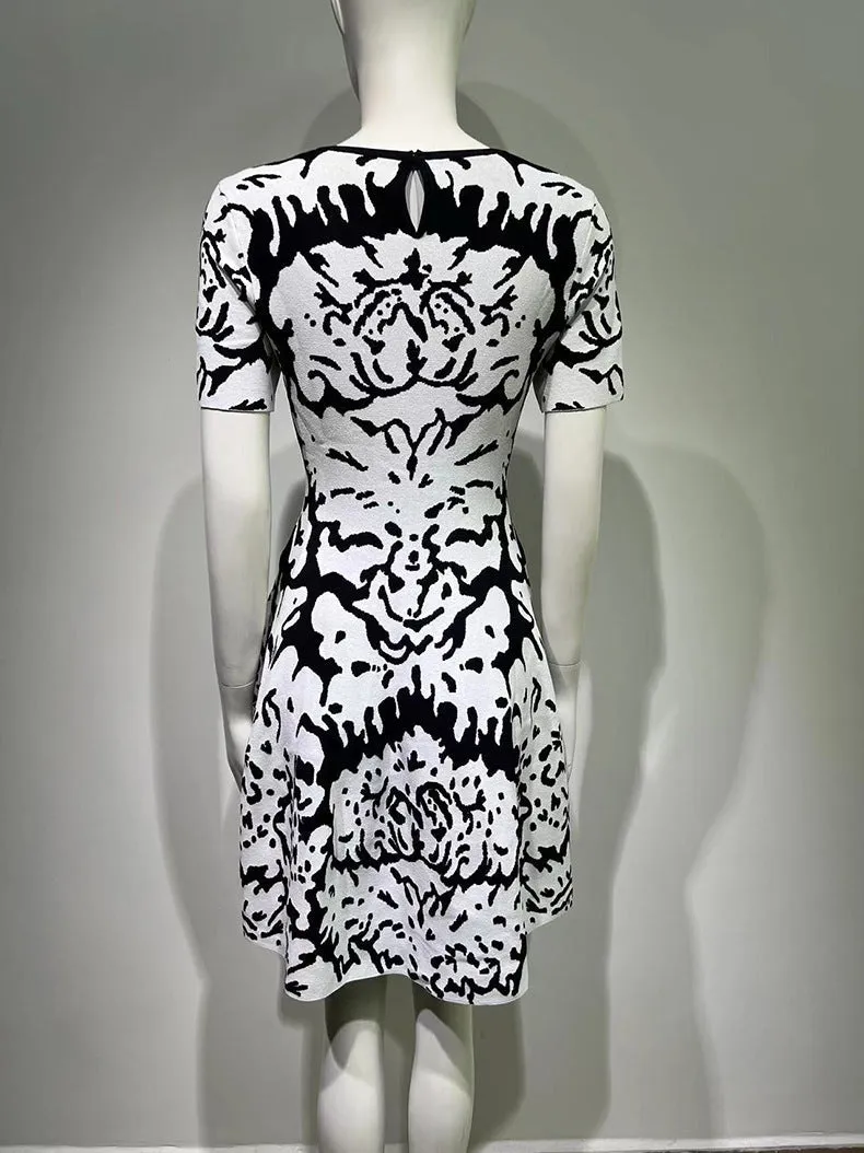 FLORAL-PATTERN STRETCH-KNIT MINI DRESS Gloria Lanvin
