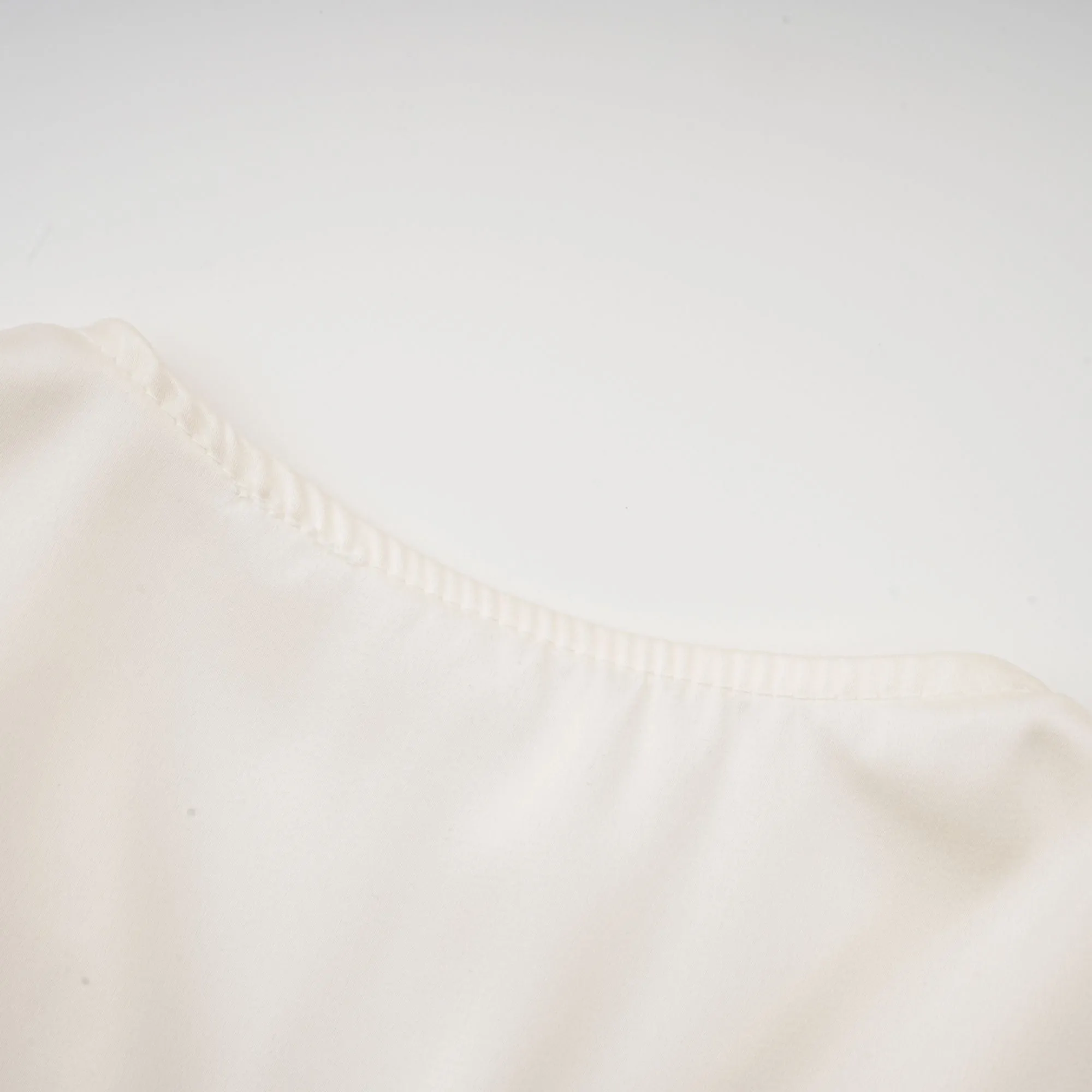 Nouria white faux-flower twist cropped top Gloria Lanvin