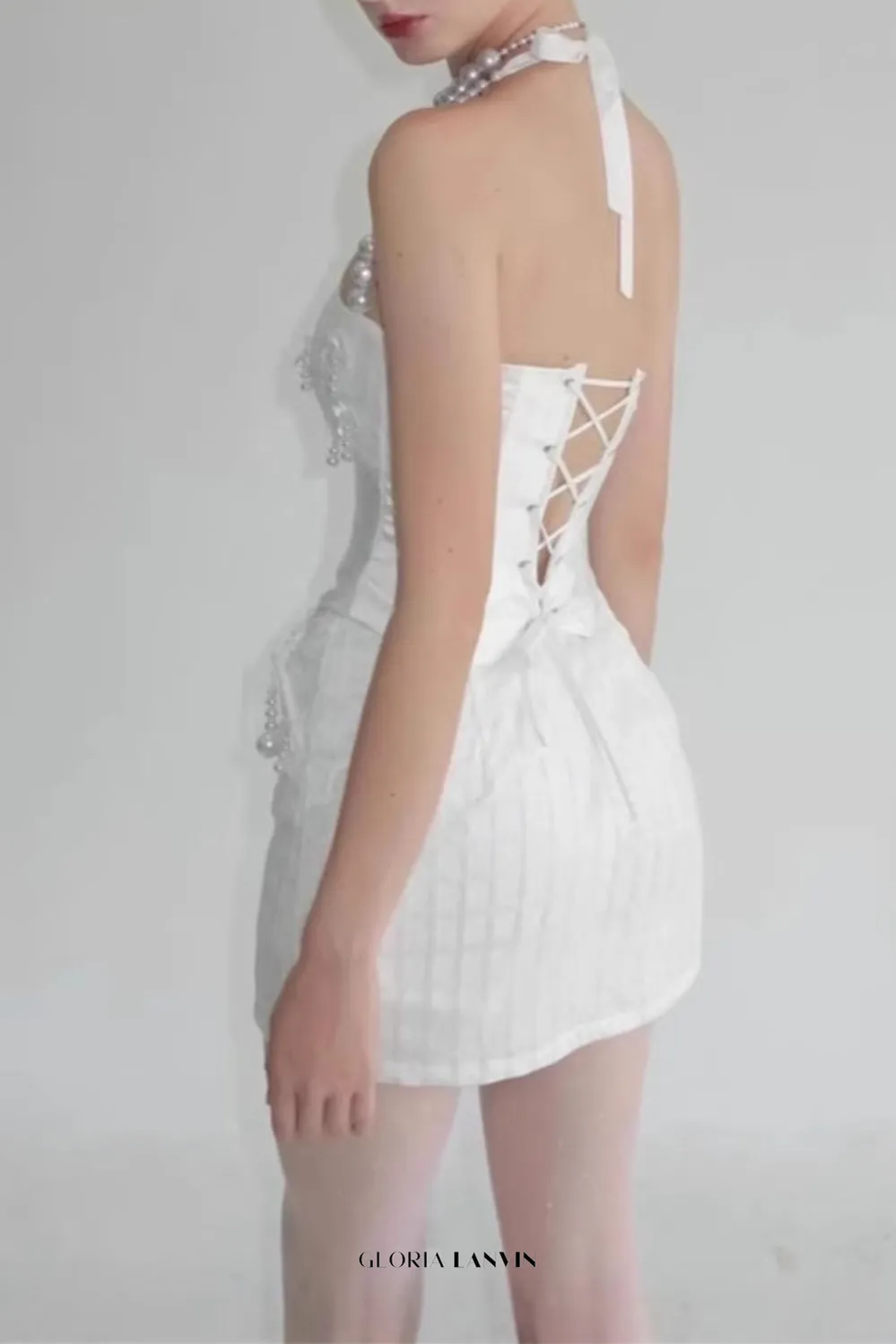 pearl fishbone wrap top skirt set in white Gloria Lanvin