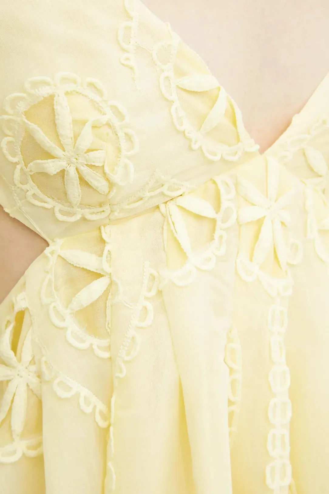 tiffany v-neck puff sleeve hollow mini dress in yellow Gloria Lanvin